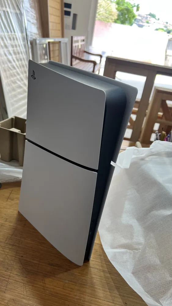 Foto do console e embalagem